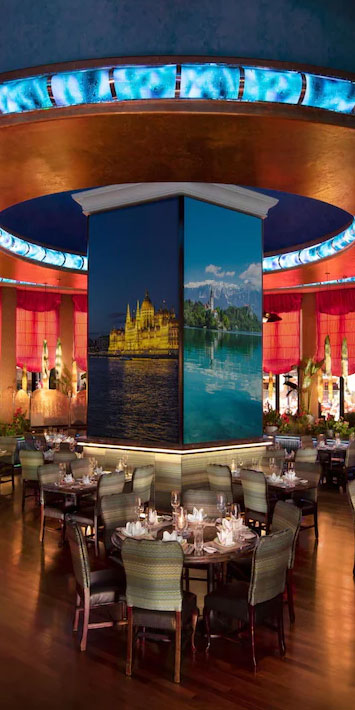 Multi-screen video wall digital signage showing various nature and ocean scenes within Peppermill casino powered by BrightSign media players