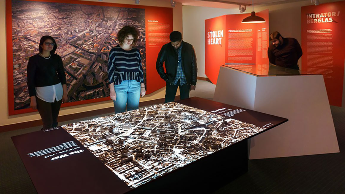 BrightSign technology in a museum outlining a map during war time in 1943
