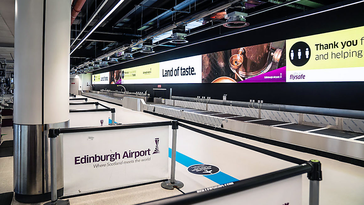 ejemplo de señalización digital BrightSign distribuida por toda la terminal del aeropuerto de Edimburgo