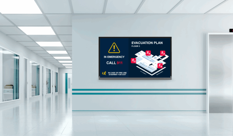 Real-time digital wayfinding and emergency alert signage in hospital hallway