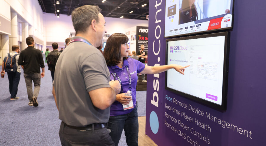 BrightSign sales team member showing bsn.Control device management services to a customer