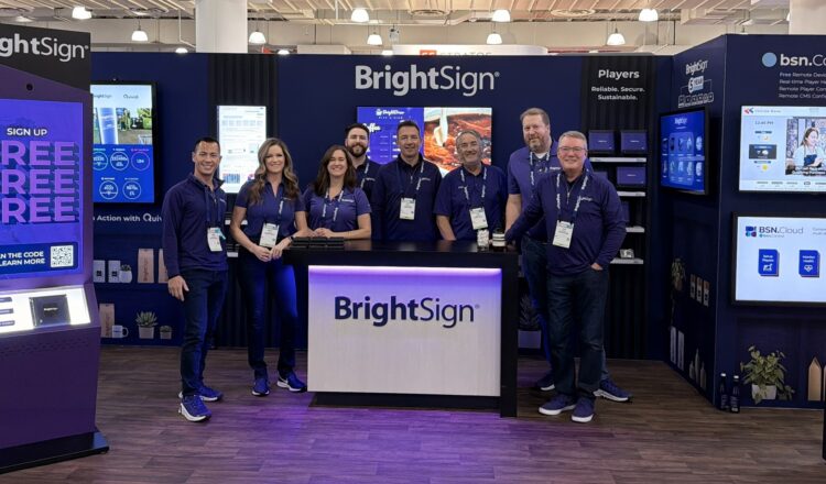 BrightSign team in front of their booth at the retail show NRF '26