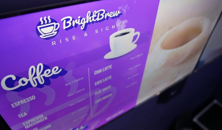 Video thumbnail showing a coffee shop digital menu board